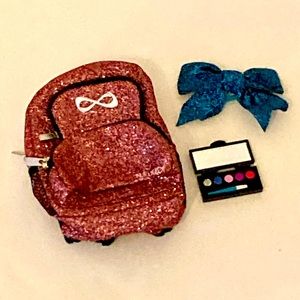 American girl doll cheer backpack with makeup and a a bow